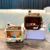 Chaveiro de máquina de pegar bolinhas de desenho animado, pingente de chaveiro de brinquedo criativo para alívio do estresse, pingente para mochila de estudante, atacado de pequenos presentes