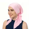 AliExpress nuevo gorro de punto de color liso con dos pompones de arco europeo y americano en stock