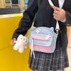 Bolsa mensageiro atacado lona menina bolsa pequena ins fofa doce bolsa de ombro macia menina pequena fresca estudante bolsa mensageiro