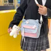Bolsos cruzados de lona al por mayor para niñas, bolsos de hombro lindos y dulces, bolsos cruzados para estudiantes suaves y frescos