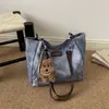 Elegante y ligera bolsa estilo bosque, bolsa tote francesa de nicho, bolso cruzado casual de lujo ligero y alta estética