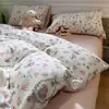 Nuevo juego de cuatro piezas de gasa de doble capa, funda de edredón amigable con la piel, juego de tres piezas para dormitorio de estudiante, funda de almohada y sábana para el hogar