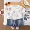 Nuevo Conjunto de Verano de Manga Corta con Oxígeno para Niños Pequeños y Niños Dibujos Animados Hilo Cuello Redondo Manga Corta Delgado Ropa de Bebé Conjunto de Dos Piezas Moderno
