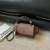Bolsa de nicho moderna e minimalista, bolsa transversal vintage nova da primavera de 2026, versão coreana bolsa de mão simples para o dia a dia bolsa quadrada pequena