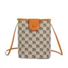 Bolso de mano pequeño retro estampado de comercio exterior para mujer, nuevo bolso versátil casual para hombro o bandolera 2026 para viajes y compras, bolso para teléfono