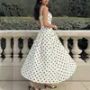 Vestido elegante com suspensório 2026 roupas femininas transfronteiriças europeias e americanas casual poá francês retrô vestido longo