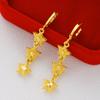 Pendientes de corazón chapados en oro de imitación de latón, venta al por mayor, para mujer, con forma de corazón de melocotón, joyería con temperamento de oro arena de Vietnam.