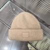 Chapéu de lã outono e inverno feminino solto com aplique bege chapéu para o frio quente grosso novo proteção para as orelhas chapéu de tricô
