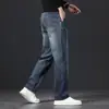 Jeans rectos de cintura alta para hombre de otoño e invierno, fibra acrílica, cálidos, cepillados, pantalones de hombre, casual de negocios, en stock para venta al por mayor