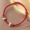 Pulsera tejida a mano con cuentas de transferencia, Cuerda de ocho hilos semiacabada en oro usable de 2.5 mm Flor de durazno, Mismo estilo para hombres y mujeres
