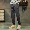 Atacado direto marca de moda calças casuais masculinas primavera e outono esportivas dedo do pé soltas Joker calças de trabalho masculinas outono e inverno