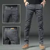Calças casuais masculinas de alta qualidade, novas calças retas slim-fit primavera 2026, calças versáteis de negócios elásticas para homens, primavera e outono