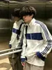 Sudadera de moda con cremallera y cuello alto de retazos azul y blanco estilo chino, colección de otoño, estilo para hombres y parejas, con tres rayas, prenda exterior casual y deportiva