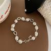 Versão coreana de design de nicho personalidade de ponta pulseira de pérolas feminina estilo ins luz de luxo pulseira requintada 2022 Novo