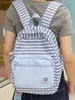 Mochila con estampado de rayas estilo coreano, moderna y versátil, mochila de nicho estilo Ins para estudiantes de secundaria, preparatoria y universidad