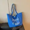 Bolsa de Lona Grande de un Solo Hombro Rayada Bordada con Letras Transfronteriza Estilo Coreano de Nicho para Viaje Primavera/Verano 2026