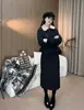 Popular y elegante tejido negro otoño-invierno 2026 nuevo modelo conjunto completo