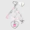 Ins Dulce Femenino Estilo Universitario Vidrio Flor Oso Lazo Fresa Corazón Alas Llavero DIY Colgante de Bolsa