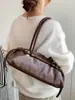 Bolso de hombro minimalista de nicho estilo coreano Shuai Mi Jia para mujer, nuevo modelo de moda otoño 2026, bolso baguette para debajo del brazo