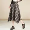 Elegante falda de cuadros para mujer, nuevo estilo otoño e invierno 2026, de cintura alta, falda de línea A adelgazante, falda versátil de dobladillo grande irregular