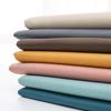 Tejido de tecnología de tres pruebas al por mayor, tejido de gamuza bronceado, tejido suave para cojines y almohadas, tejido impermeable para sofá.