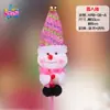 Regalo de Navidad niños sosteniendo anciano alce muñeco de nieve bastón decoraciones navideñas Papá Noel varita mágica