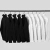 Camiseta de rayas para hombre primavera y otoño ropa interior popular suéter de cuello alto talla grande holgado versátil diario manga larga camisa básica negra y blanca