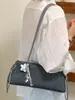 Elegante Bolso Baguette Xiaomi Coreano de Nicho Fresco Dulce Nuevo Otoño Temprano 2026 Bolso de Hombro de Alto Valor Simple para el Trabajo