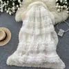 Falda de malla tipo pastel de cintura alta estilo coreano para mujer, con bordes rizados, falda midi de línea A, falda larga adelgazante y voluminosa, nuevo modelo de verano 2026