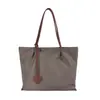 Bolsa Tote Simples de Mão Feminina 2026 Novo Estilo Diária Repelente à Água Bolsa de Tecido de Nylon Versátil de Ombro Único Transversal