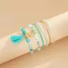 Pulseira de Contas de Vidro Azul Europeia e Americana Transfronteiriça Mais Vendida Pulseira Elástica Elegante Feminina com Borla Azul