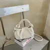 Bolso de mujer elegante Shuai Mi Jia, versión coreana, gran capacidad, nuevo modelo otoño 2026, bolso de hombro plisado, moderno y elegante