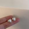 Pendientes de metal con forma de ojo de gato y perla estilo retro francés para mujer, aretes femeninos de personalidad coreana, sencillos y versátiles, con temperamento