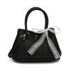 Corea del Sur Moda Estilo Casual Simple Bolso de Cubo Portátil para Mujer Elegante Estilo de Alta Gama Práctico Combinable Color Sólido Bolso Cruzado