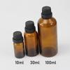 Botella pequeña de vidrio marrón a prueba de luz para aromaterapia, ideal para hacer tú mismo, con aceite esencial y crema.