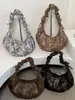 Bolsa de Bolinho Estampa de Leopardo Moda Retrô Outono 2026 Nova Bolsa Leve de Axila Sensação Preguiçosa Relaxada Bolsa de Ombro Único Transversal