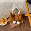 Lindo bolso de retazos de lana de cordero de invierno para mujer, nuevo estilo 2026, bolso de hombro retro de gamuza, bolso cruzado de moda