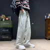 Venta al por mayor de fabricante comercio exterior pantalones deportivos de moda estilo americano para hombre, pantalones casuales de pierna recta holgados con cordón talla europea