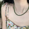 Collar de acero inoxidable con hebilla de lingote de plata y calcedonia verde blanca con cuentas de jaspe, nuevo estilo chino, cadena de clavícula roja con temperamento para mujer
