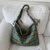 Bolsa de Lona Xadrez para Mulheres 2025 Novo Estilo Literário Ins Coreana Bolsa de Trabalho Casual Estudante Festa Aula Bolsa Transversal