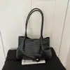 Bolso de mano tejido de gran capacidad estilo coreano, moda versátil de verano 2026, diseño de nicho, bolso de hombro elegante