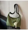 Bolsa de Ombro Lona Transfronteiriça Formato Dumpling Feminina Casual Grande Capacidade para Axila Diária Versátil para Trabalho Transversal