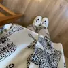 Pijama de seda helada con estampado de leopardo para mujer, nuevo estilo primavera y otoño, conjunto de ropa de casa de seda helada de lujo de alta gama, venta al por mayor transfronteriza