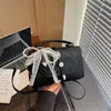 Bolso pequeño retro de alta gama y moderno para mujer, nuevo modelo 2026, estilo coreano de moda, elegante bolso cuadrado pequeño de mano, bolso cruzado versátil