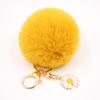 Venta Caliente Llavero Colgante Bola de Pelo de Margarita Moda para Mujer Bolso Felpa Monedero Coche Colgante Girasol