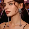 Brincos de estilo étnico boêmio, tarraxas populares transfronteiriças cravejadas de diamantes, brincos longos elegantes de franja vintage para mulheres