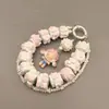 Bubble Mart Serie Moe Grain Hug Cadena Corta para Teléfono Móvil Hug Lindo de Pie Moe Grain BABY Cadena de Teléfono Móvil Juguete de Moda