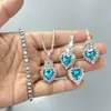 Conjunto de quatro peças estilo europeu e americano com colar, brincos e anel de cristal azul claro em formato de coração cravejado de diamantes - uma coleção transfronteiriça para mulheres