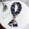 Bufanda larga nueva bufanda pequeña para mujer de Corea del Sur primavera y otoño bufanda fina estrecha de doble cara corbata de moda decorativa