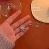 Colar de floco de neve giratório de design exclusivo corrente de suéter feminino 2023 nova corrente de clavícula de nicho de luxo leve de alta qualidade